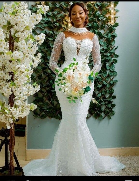 Illusion-neckline mermaid wedding gown